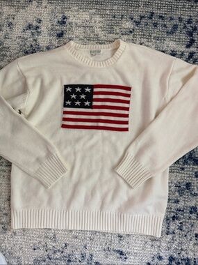 Mighty Fine American flag knit pullover sweater featuring a ribbed collar.